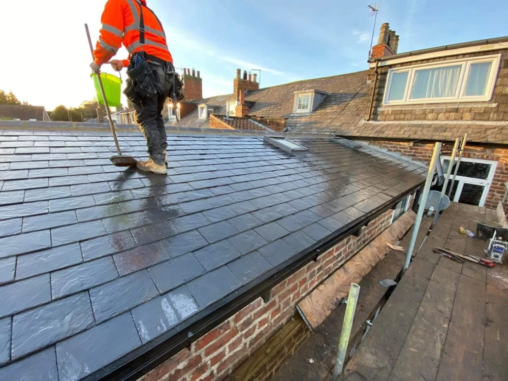 Roof repair project in Hull - Leak fixed and tiles replaced