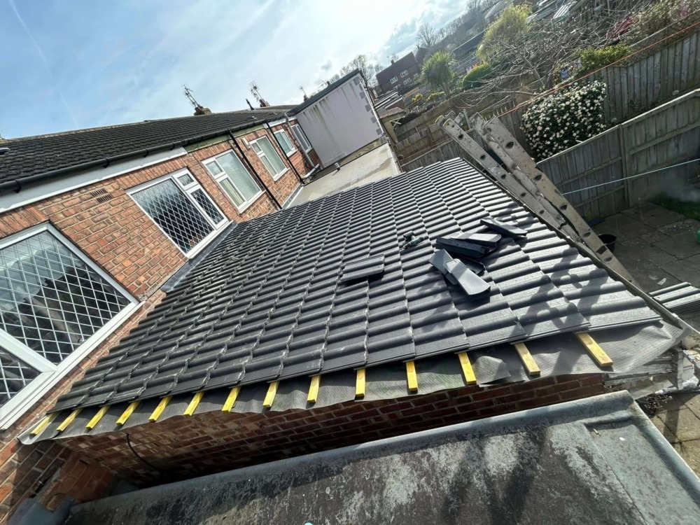 Roof tile replacement and repair project in Hull